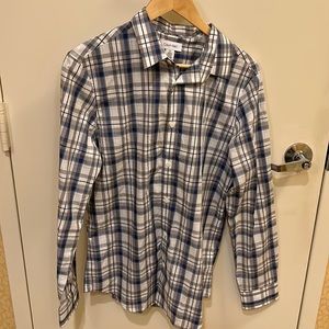 Used Calvin Klein Men’s M L/S blue, white and grey plaid look dress shirt.
